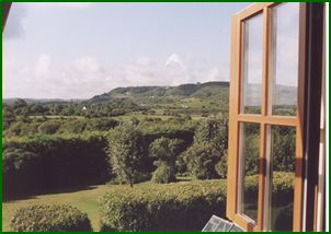 Glimpse of Clifden Hill (Cinn tSleibhe) scene of the legend of the death of Fionn's mythological hound Bran. This picture is taken from one of our upstairs bedrooms.